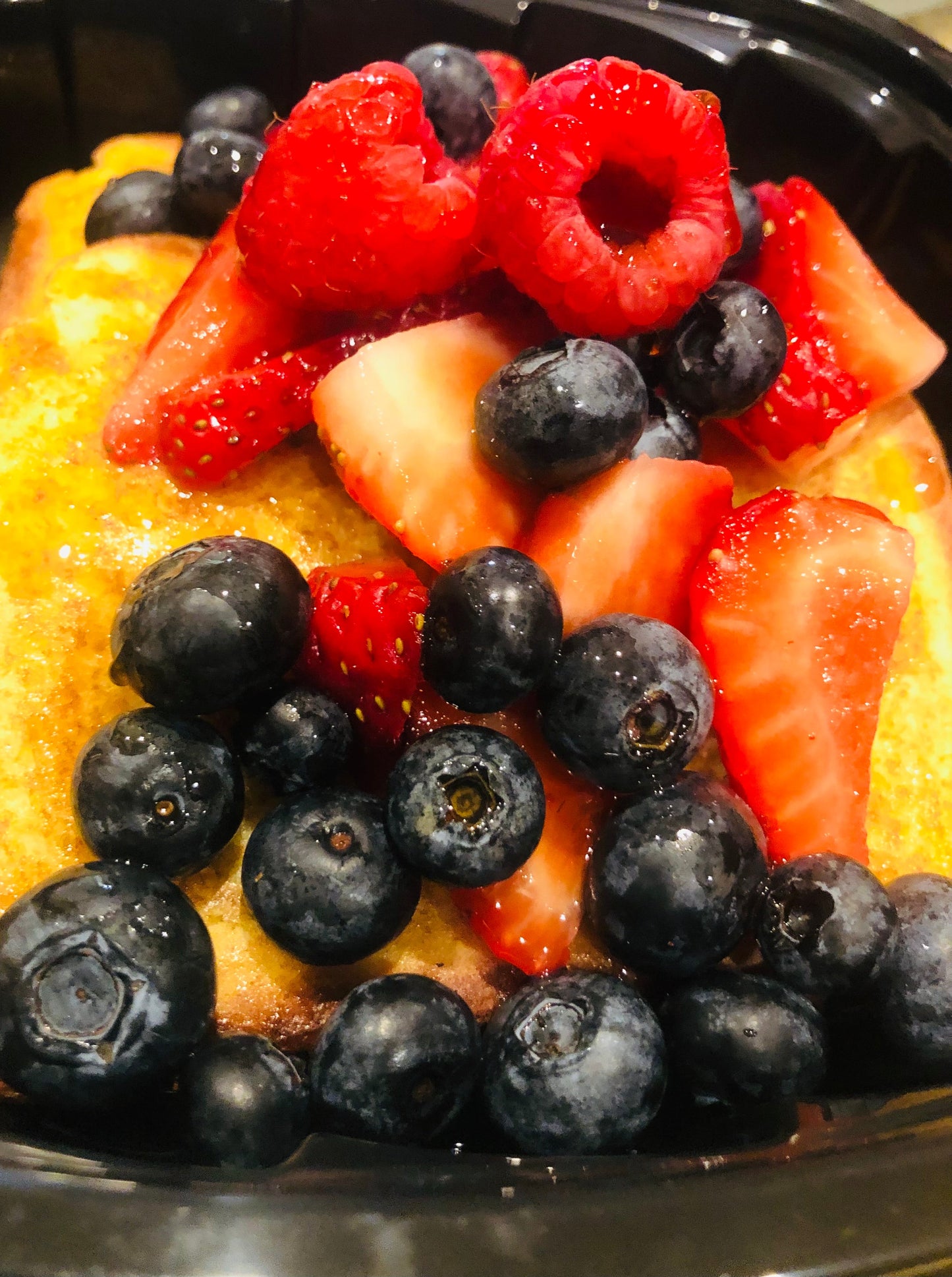 French Toast Topped w/ Fresh Mixed Berries + Sausage Patty